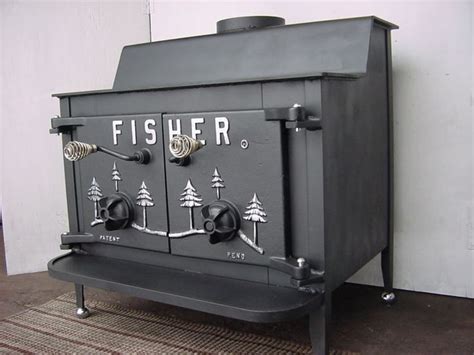 It can take 20-inch logs and heat up a home that is around 1,700 square feet. . Grandpa bear fisher wood stove for sale
